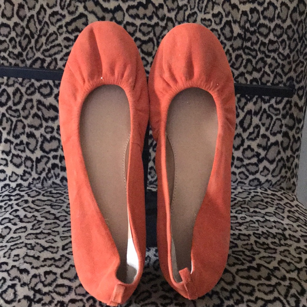 Orange suede ballet flats